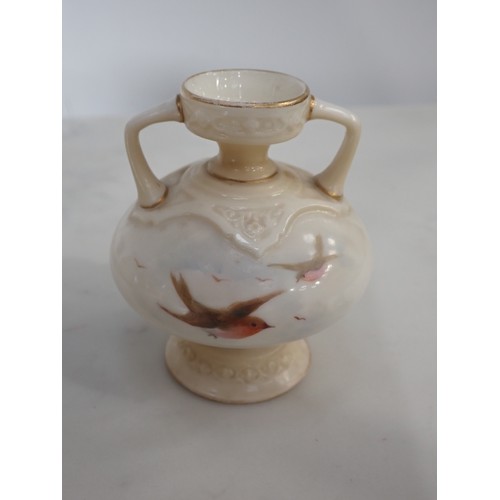 590 - Four Royal Worcester blush ivory Vases