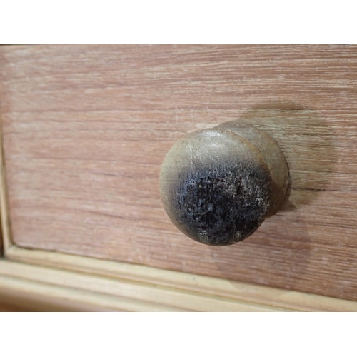 24 - A Victorian scrubbed pine Dresser with raised gallery fitted a bank of five oak drawers above three ... 