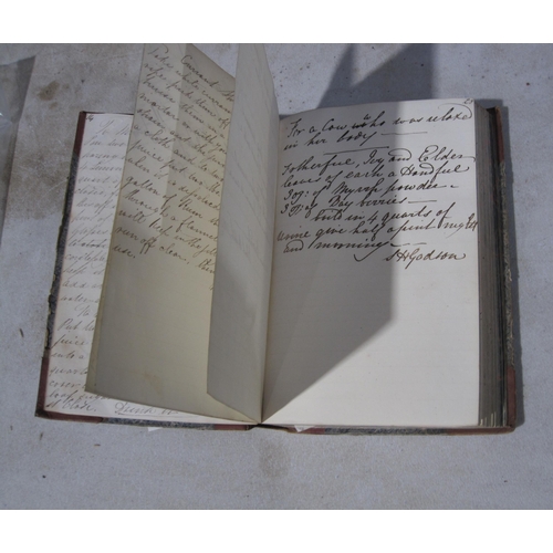 412 - An album c.1835 with handwritten cookery recipes and medical potions ,and verses,  inscribed in pen ... 