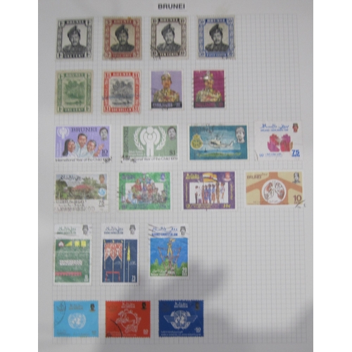 97 - A large All World Stamp Collection, principally post 1950, in 11 volumes, together with a selection ... 