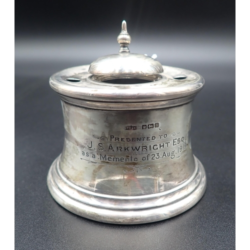 105 - A George V silver circular Capstan Inkwell with presentation inscription, Sheffield 1910