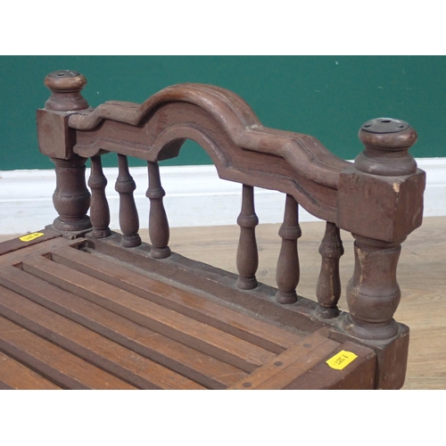 11 - A wooden Dolls Bed with carved and turned head and footboards, 21