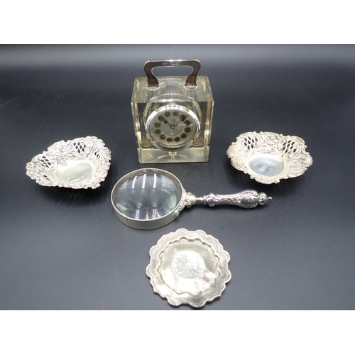 122 - A Junghans small Carriage Timepiece in glass case with silver handle, London 1910, two pierced silve... 