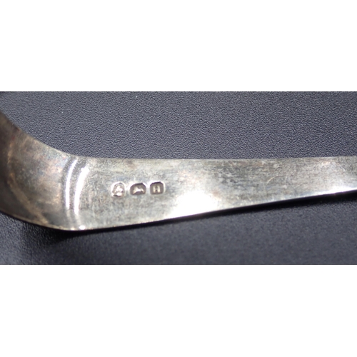 123 - A George IV silver Caddy Spoon, fiddle pattern, London 1829, a pair of Salt Spoons, London 1912, a V... 