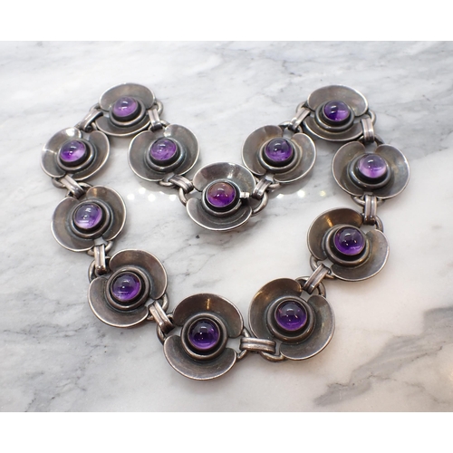 172 - A 1960's Danish Amethyst Necklace having circular links each close-set round cabochon by Danske Guld... 