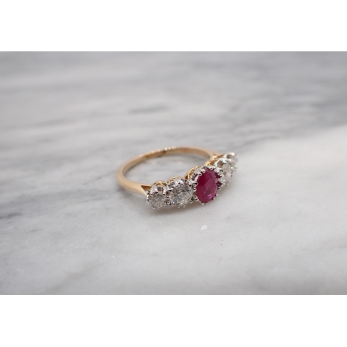 183 - A Ruby and Diamond five stone Ring claw-set oval-cut ruby between two graduated pairs of brilliant-c... 