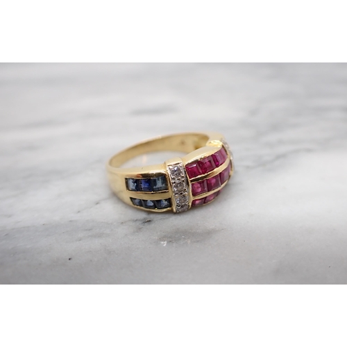 185 - A Ruby, Diamond and Sapphire Ring the wide band channel-set three rows of calibré-cut rubies between... 