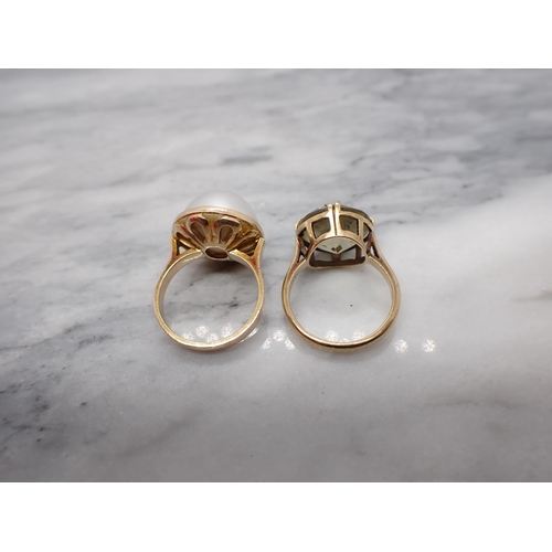 186 - A Mabé Pearl Ring stamped 14K, ring size I and a Citrine Dress Ring claw-set round stone in 9ct gold... 