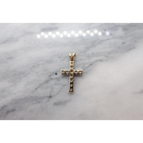 203 - A small Pendant Cross set cubic zirconia