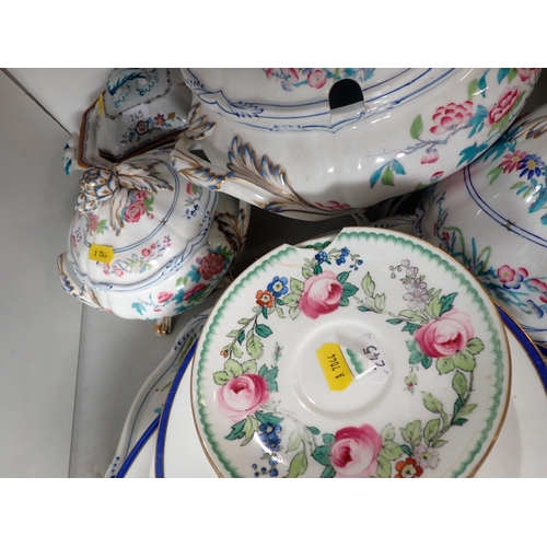 245 - A Felspar part Dinner Service including a turkey dish, covered tureen, dishes and plates, some worn ... 