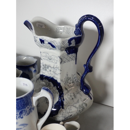 246 - A quantity of blue and white items including Plates, Jugs, etc