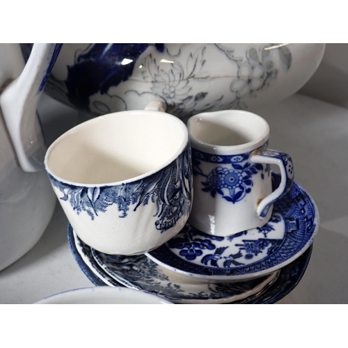 246 - A quantity of blue and white items including Plates, Jugs, etc