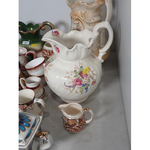 258 - A large quantity of china including Teaware, Toilet Jugs, a glass Fish, a Yardleys English Lavender ... 