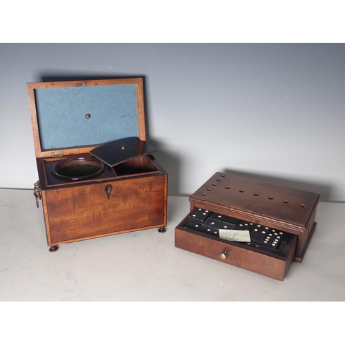 26 - A 19th Century mahogany and crossbanded Tea Caddy with lion mask ring handles and glass mixing bowl,... 