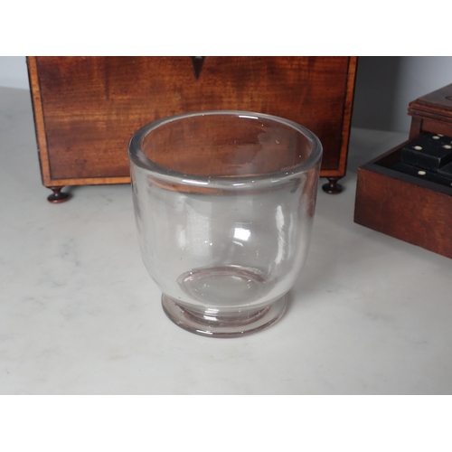 26 - A 19th Century mahogany and crossbanded Tea Caddy with lion mask ring handles and glass mixing bowl,... 