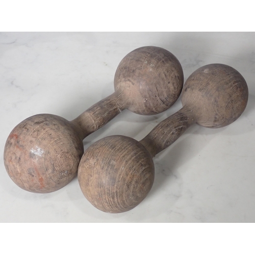 269 - A spelter model of an elephant on oval wooden base, 9in and a pair of wooden Dumbbells