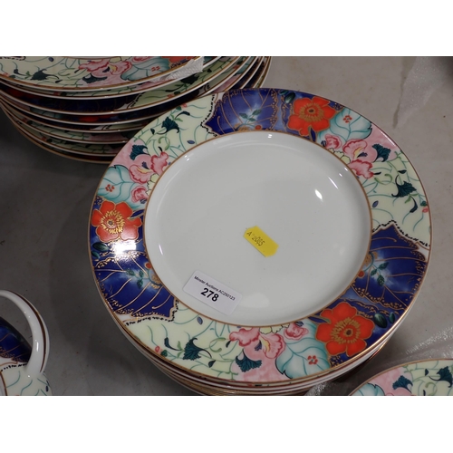 278 - A Limoges Dinner Service for eight people with floral borders