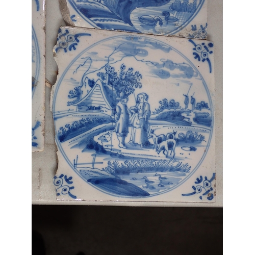 286 - A Box of Tiles including some Delft, decorated with country scenes and a quantity of diamond shaped ... 