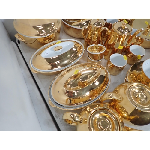 292 - A Royal Worcester Gold part Service including, Teapots, Coffee Pot, Tureens, Plates, Dishes etc, A/F... 