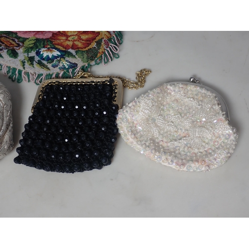 30 - A beadwork Purse decorated with roses and three other Purses