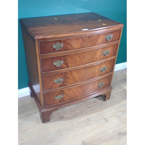 302 - A mahogany veneered Chest of four long drawers 2ft 10in H x 2ft 5in W