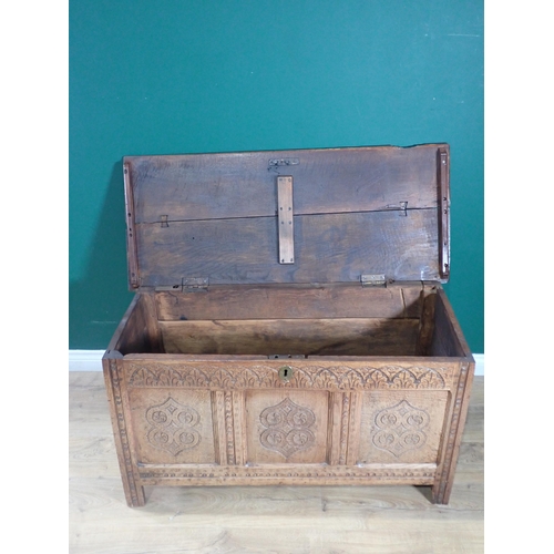 305 - A 17th Century and later oak Coffer with carved three panel front 3ft 9in W x 2ft 1in H