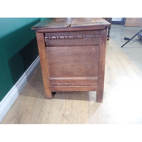 305 - A 17th Century and later oak Coffer with carved three panel front 3ft 9in W x 2ft 1in H