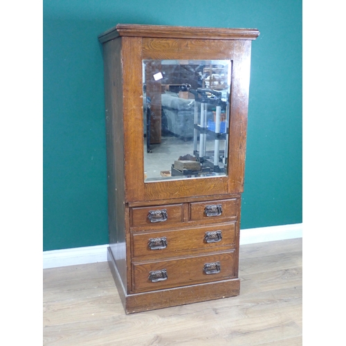 323 - An oak Safe Case with mirror door above two short and two long drawers 4ft 3in H x 2ft W and a Birmi... 