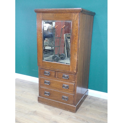 323 - An oak Safe Case with mirror door above two short and two long drawers 4ft 3in H x 2ft W and a Birmi... 