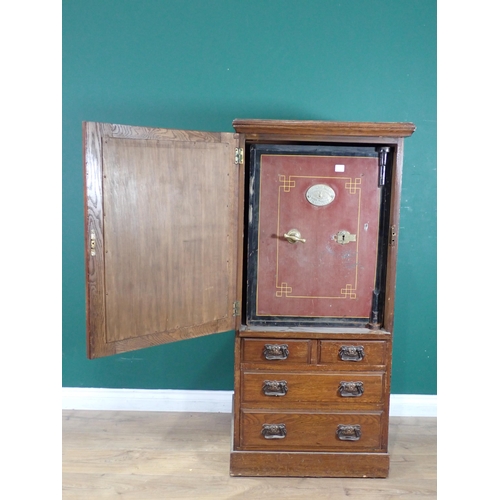 323 - An oak Safe Case with mirror door above two short and two long drawers 4ft 3in H x 2ft W and a Birmi... 