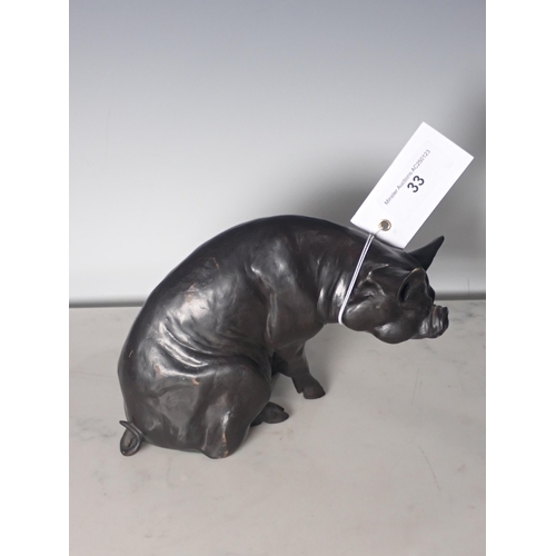 33 - A bronze Sculpture of a seated Kuni Pig, signed Maria Laing ? 2/9 5in H