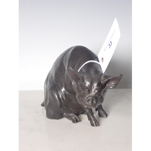 33 - A bronze Sculpture of a seated Kuni Pig, signed Maria Laing ? 2/9 5in H