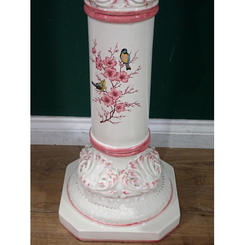 337 - A white and pink china Jardinière and Stand decorated with flowers and birds, 3ft 3