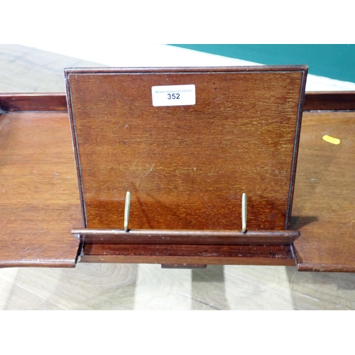 352 - A mahogany Bed Tray and Reading Stand on turned supports, bearing Carters label 2ft 3in W