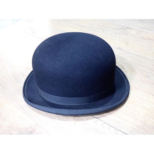 354 - A grey silk Top Hat by Locke & Co, a Trilby Hat by Locke & Co., a black Bowler Hat by Gieves, a stra... 