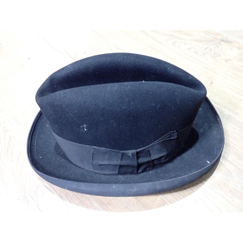 354 - A grey silk Top Hat by Locke & Co, a Trilby Hat by Locke & Co., a black Bowler Hat by Gieves, a stra... 