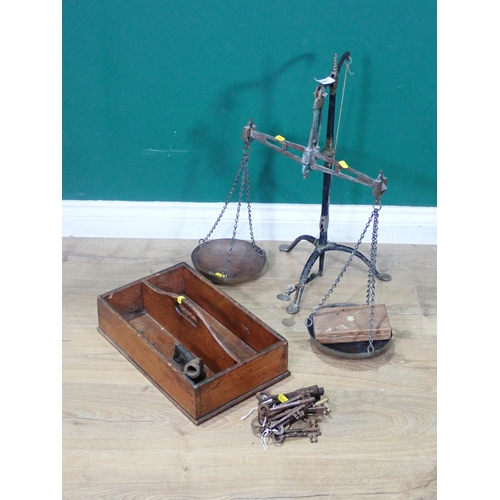 376 - An antique mahogany Cutlery Tray, a quantity of antique Keys, Scales and Weights and a Flat Iron