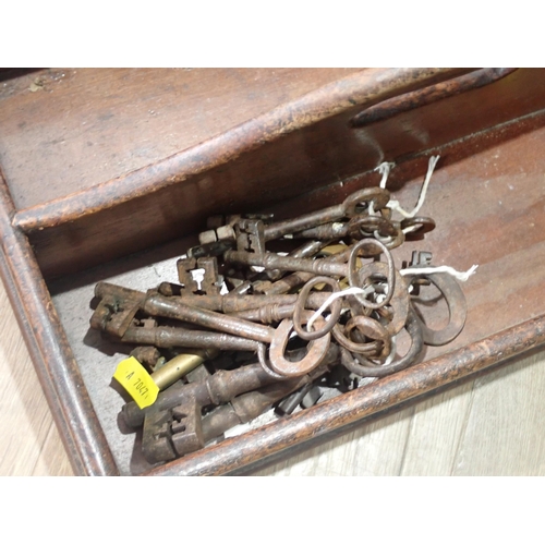 376 - An antique mahogany Cutlery Tray, a quantity of antique Keys, Scales and Weights and a Flat Iron