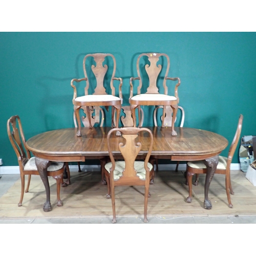 381 - A 19th Century mahogany extending D-end Dining Table with two spare leaves mounted on cabriole legs ... 