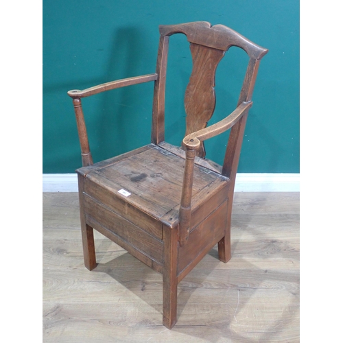 385 - A Button back Nursing Chair on turned front supports and casters, back leg stamped (Gillow 13016), a... 