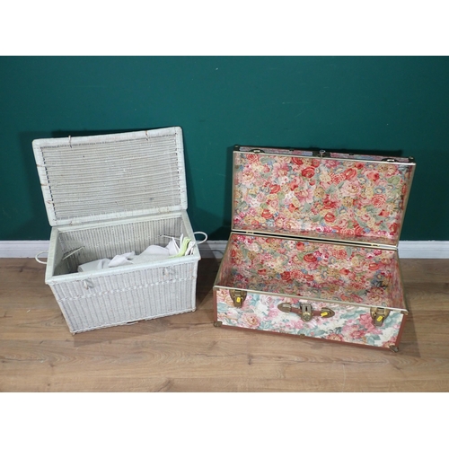 390 - A floral decorated Suitcase and a white painted Wicker lidded Basket A/F.