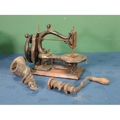 460 - An antique Sewing Machine and a Mincer