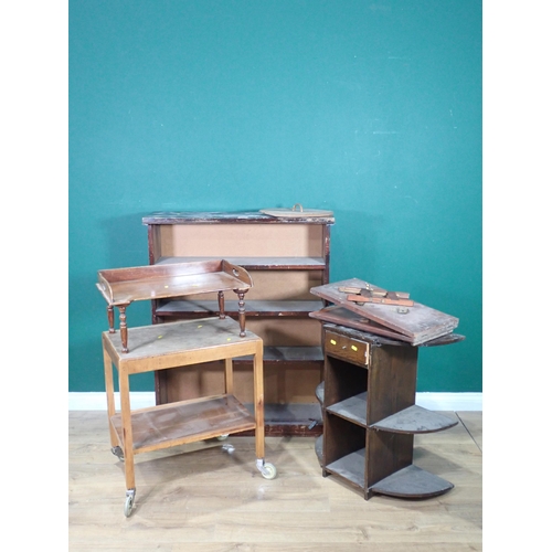 67 - A mahogany Bed Tray, a Bookcase, a Tea Trolley, oak Bookcase and a Press