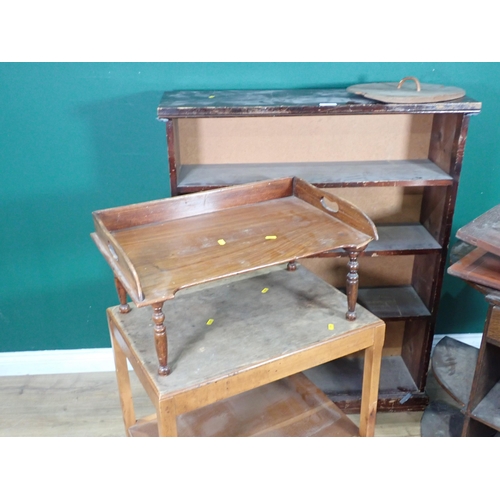 67 - A mahogany Bed Tray, a Bookcase, a Tea Trolley, oak Bookcase and a Press