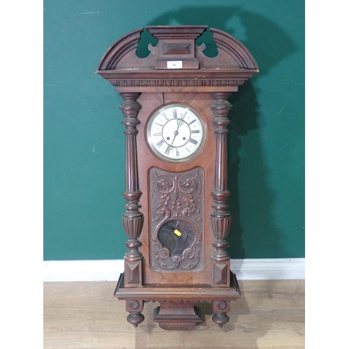 86 - A Vienna Wall Clock with carved mahogany case A/F, 3ft 10