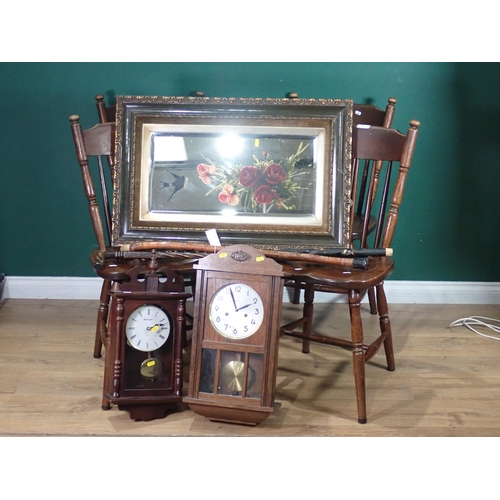 94 - A set of four oak stick back Kitchen Chairs, two Wall Clocks, a Wall Mirror painted with bird and fo... 