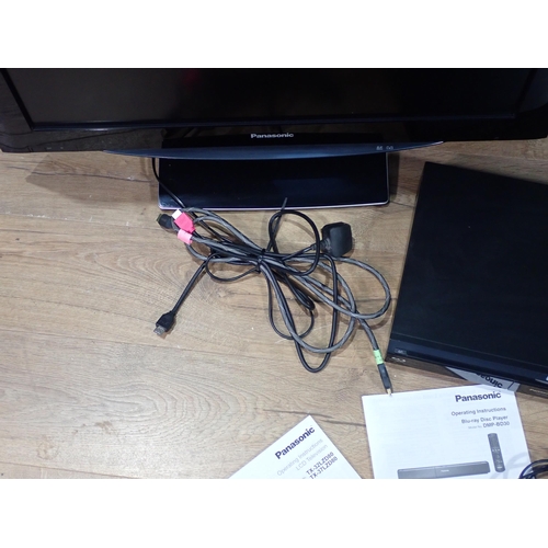 70 - A Panasonic Viera TX-32LZD80 32in TV with control, instructions and a Panasonic DVD & Bluray with in... 