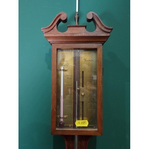 295 - A mahogany stick case barometer by Thos Wright, a cuckoo clock, two bags of floral material