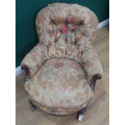 11 - A Victorian floral upholstered Easy Chair, turned front supports, the back supports stamped C. GRAHA... 