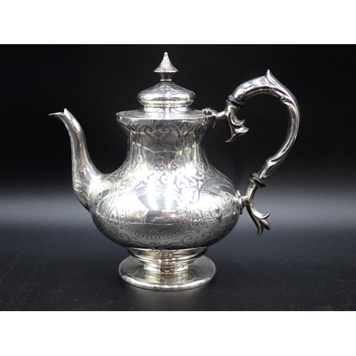 114 - A Victorian silver three piece Tea Service with engraved cartouches and initials, London 1860, maker... 